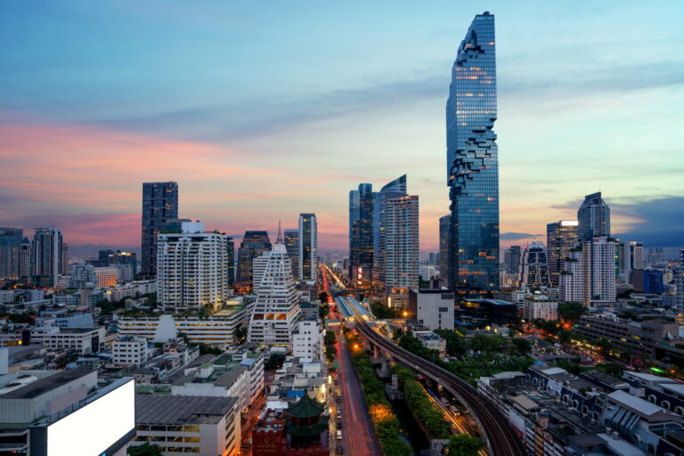 Bangkok Transportation at Dusk with Modern Business Building fro